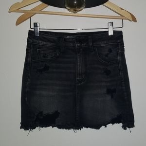 Black denim mini skirt